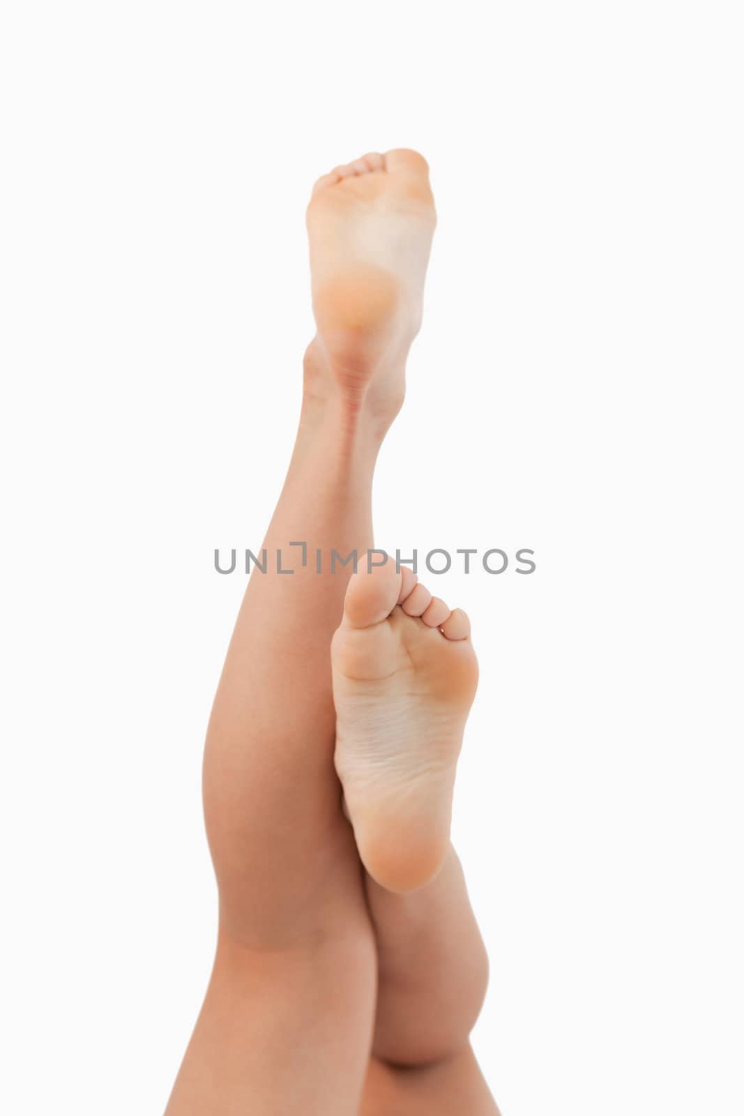 Portrait of fit feminine legs going up by Wavebreakmedia