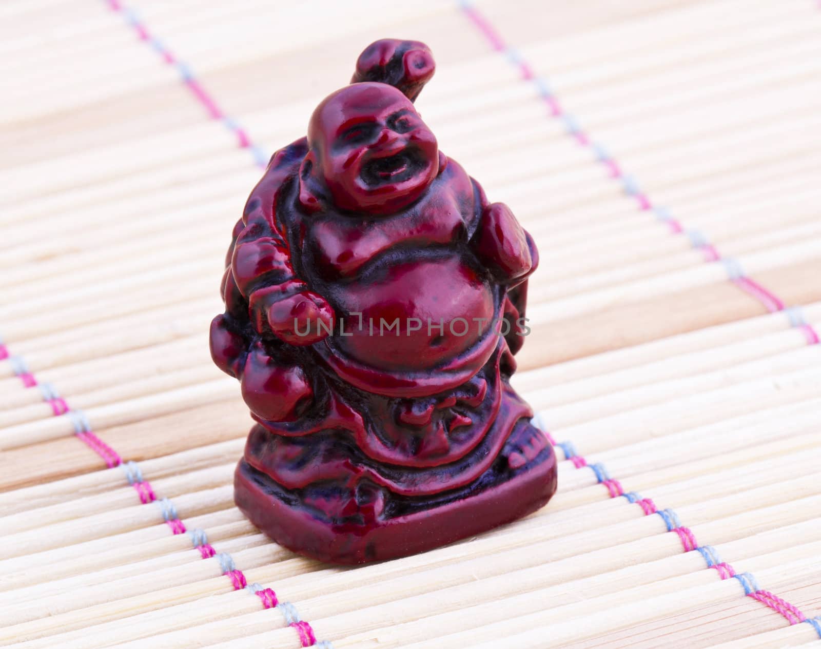 Netsuke red figure. Vintage statue.  Close up