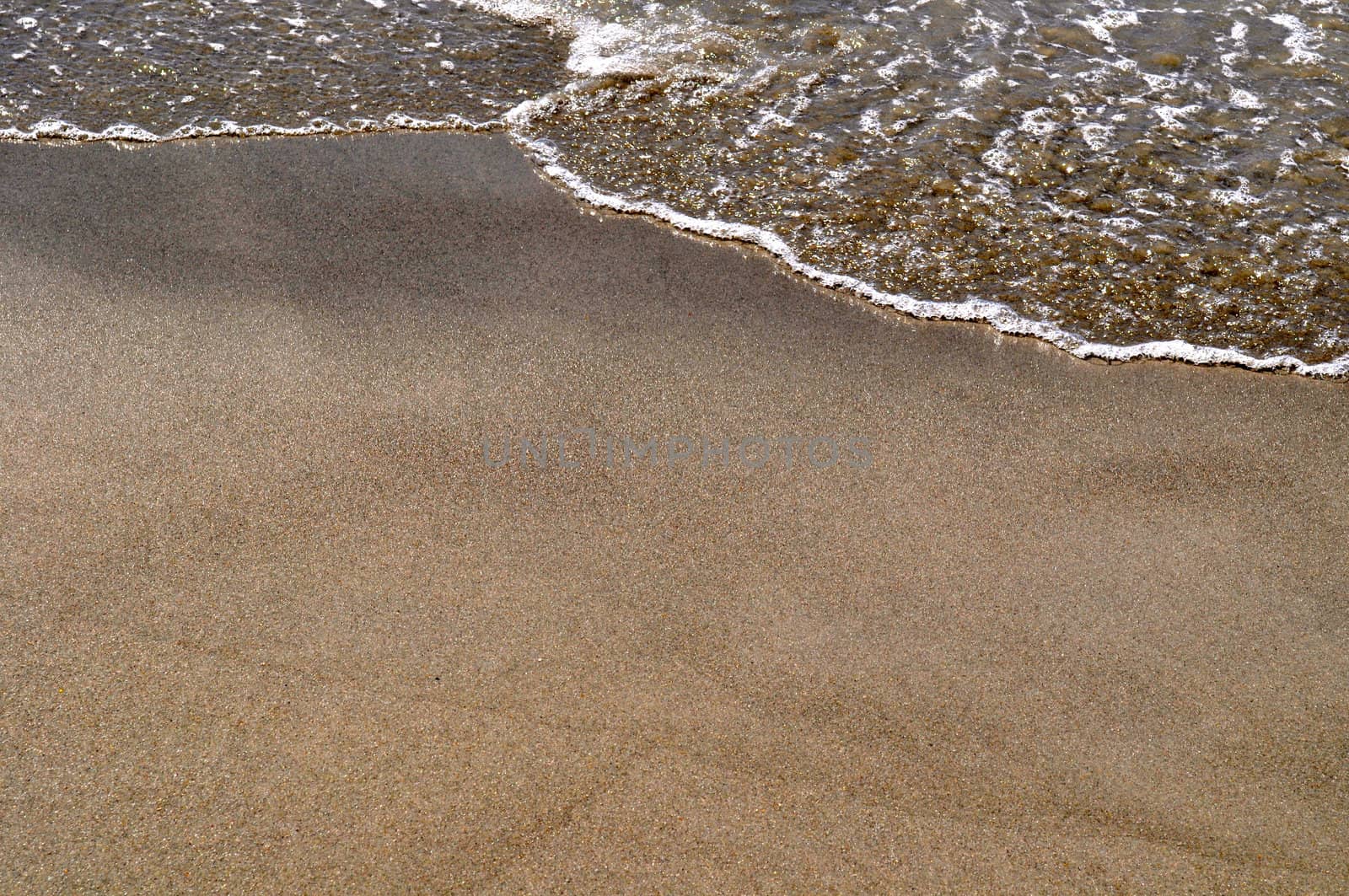 Sand and Waves by RefocusPhoto