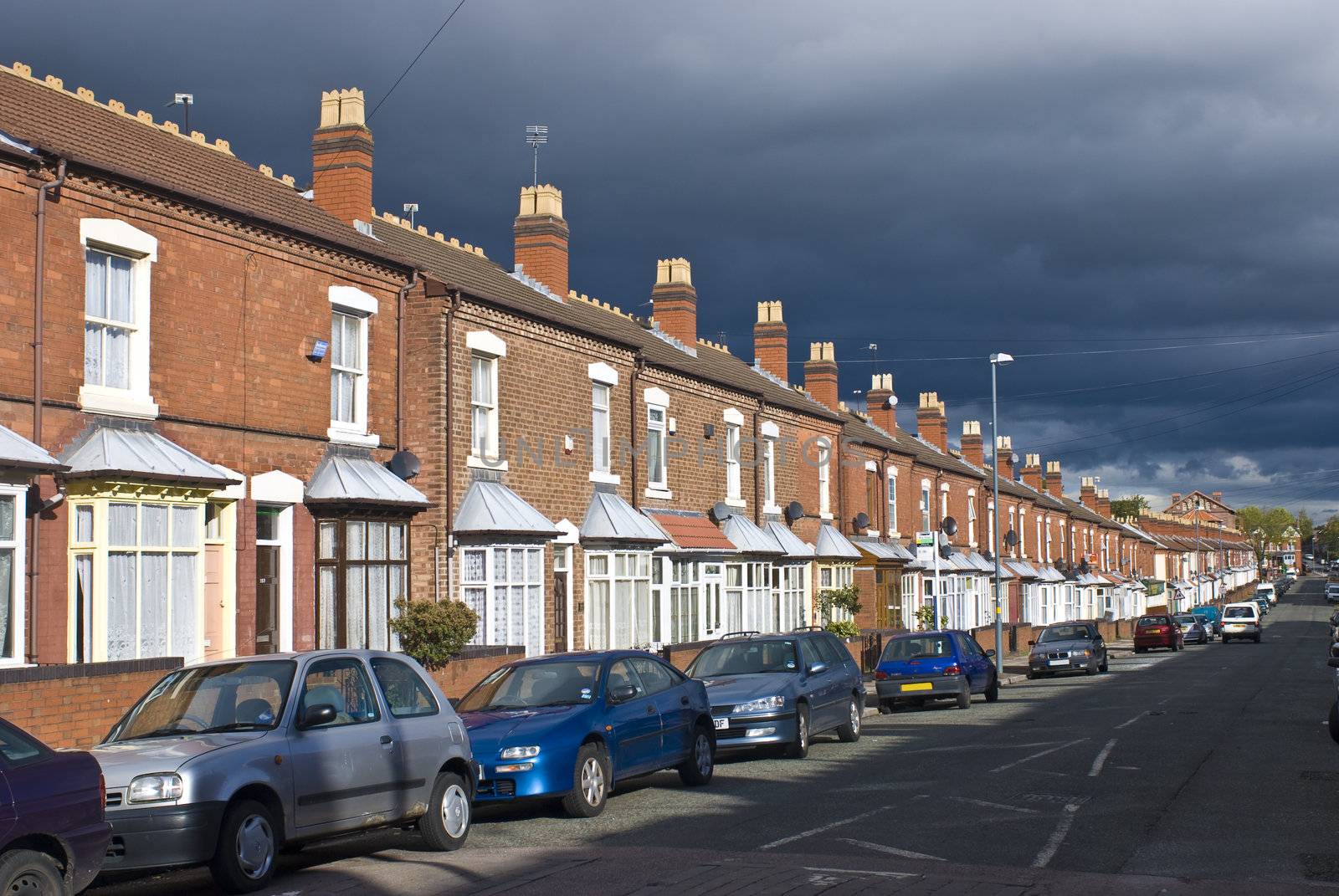 Old road with town hauses by hanusst