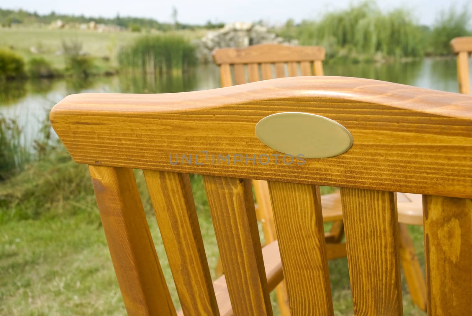 A wooden garden chair seat in a detail