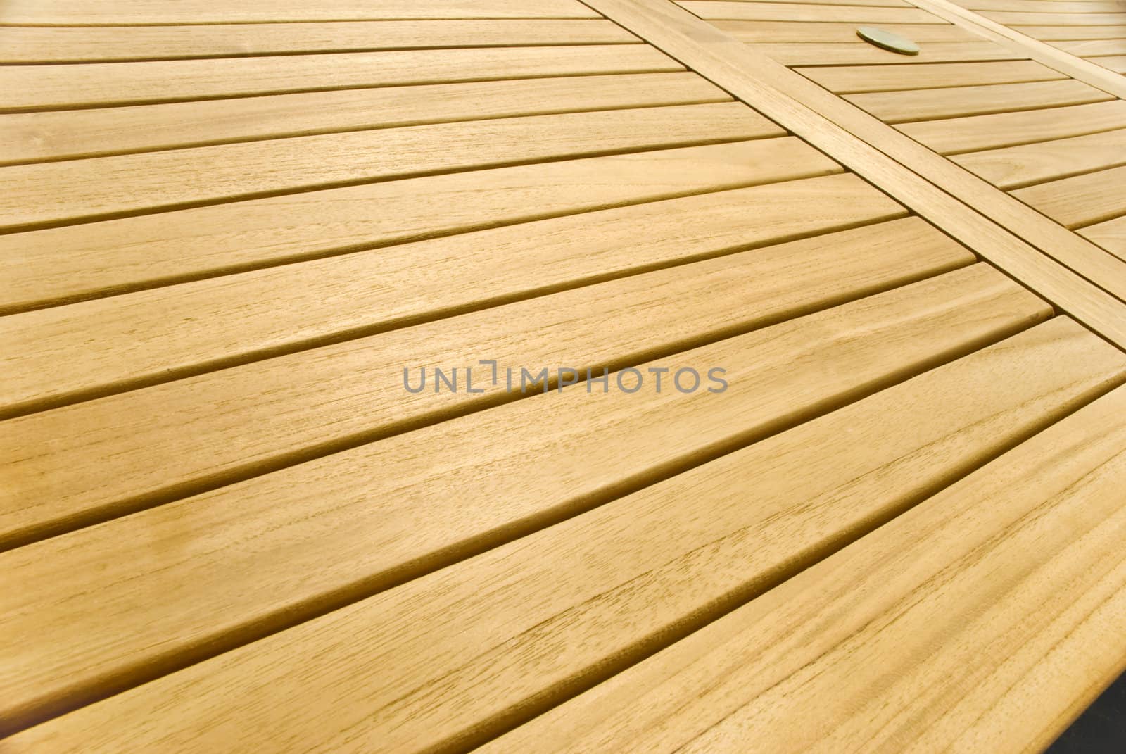 A wooden garden table in a detail