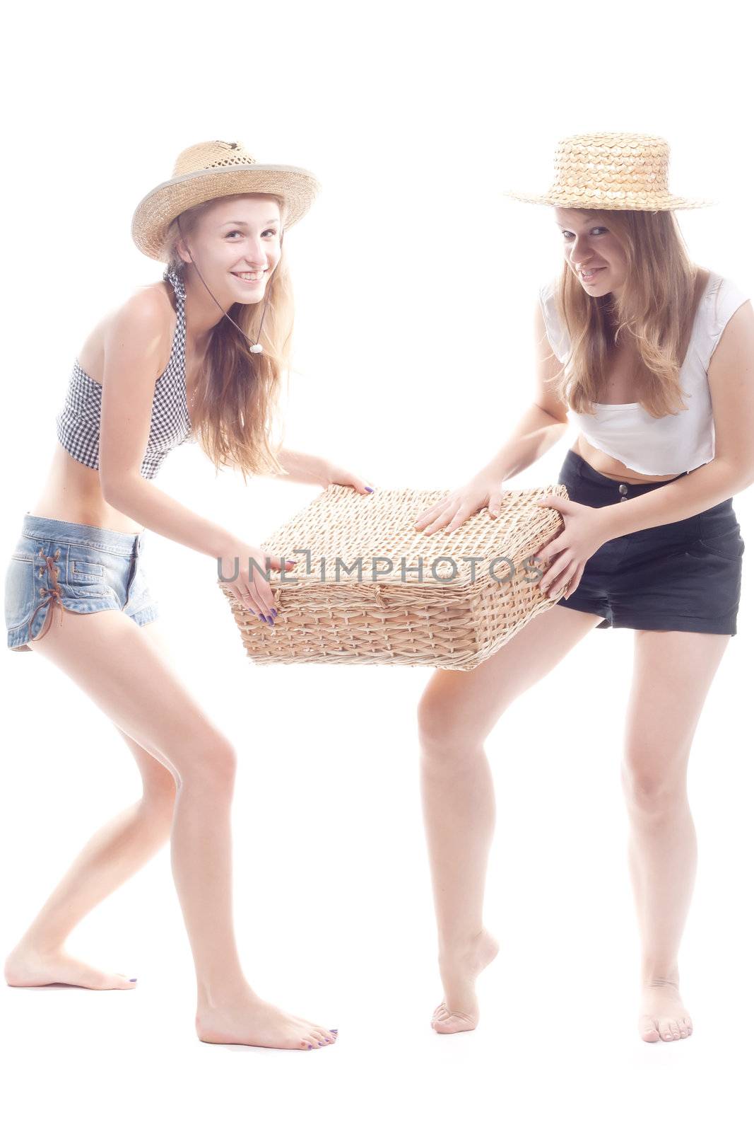Two girls in straw hats with a straw suitcase by victosha