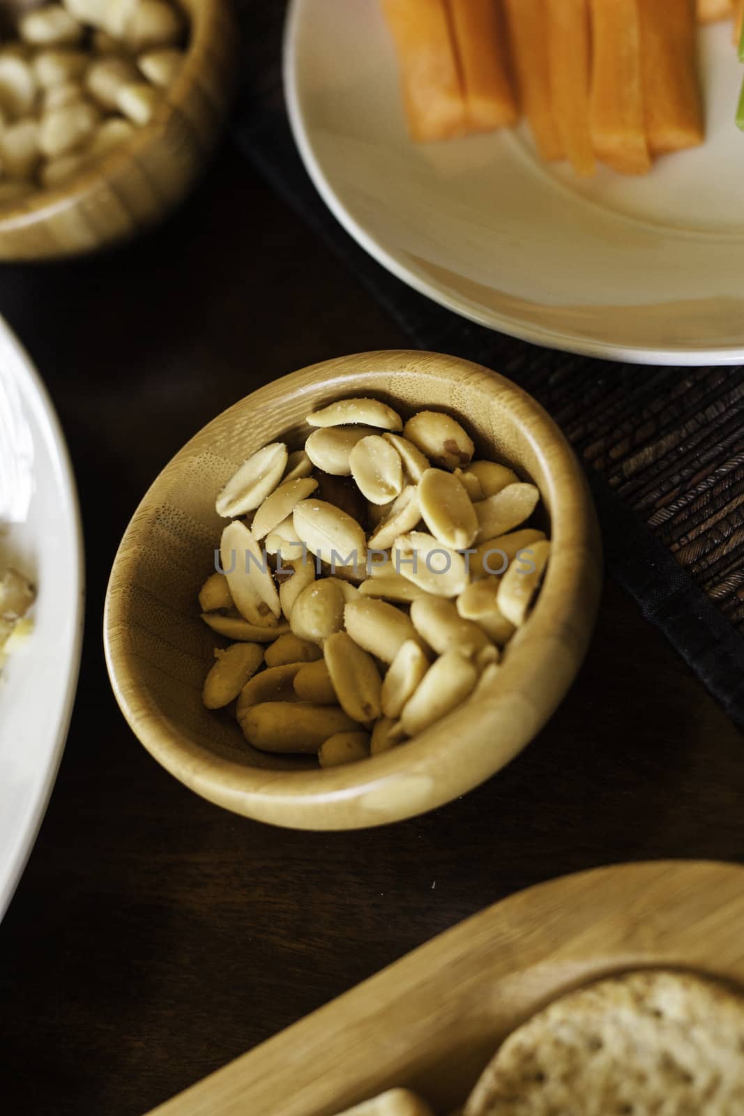Bowl of salted peanuts served as an appetizer with drinks before a catered meal or at a party