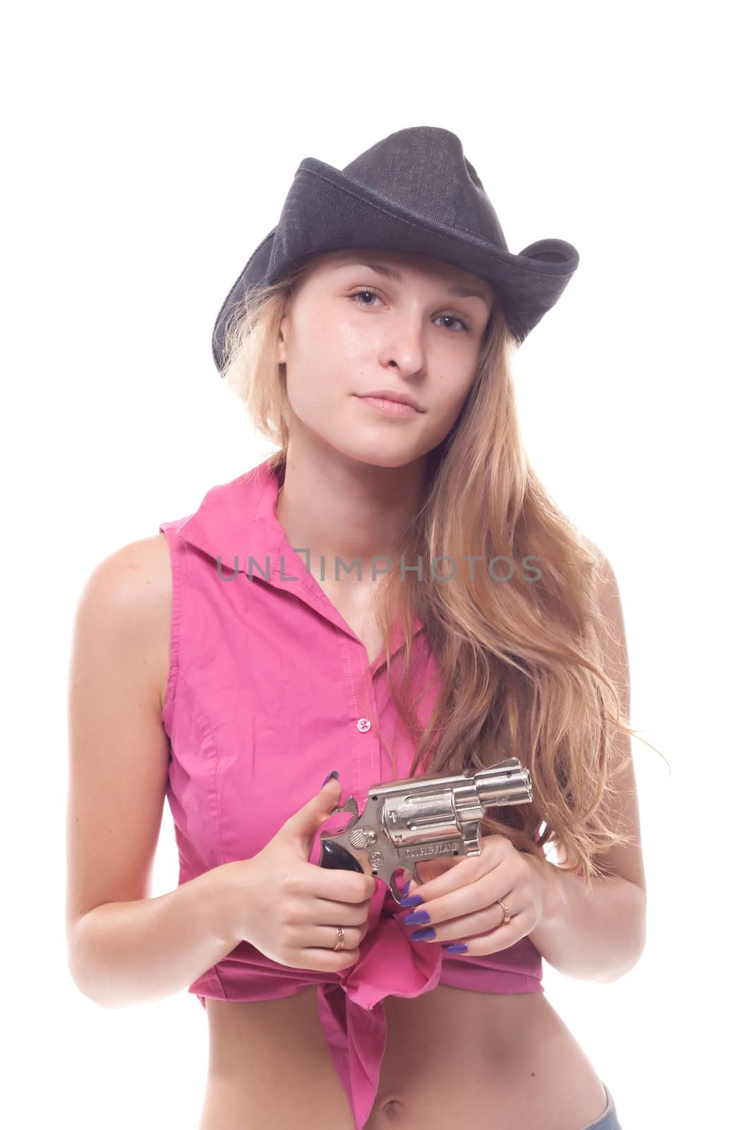 portrait of a beautiful girl with a gun shooting studio