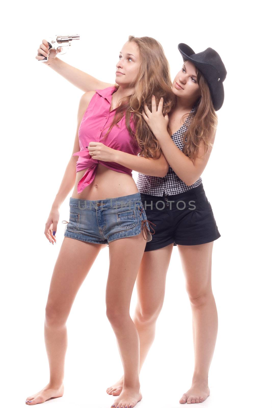 Portrait of two young girls with a gun by victosha