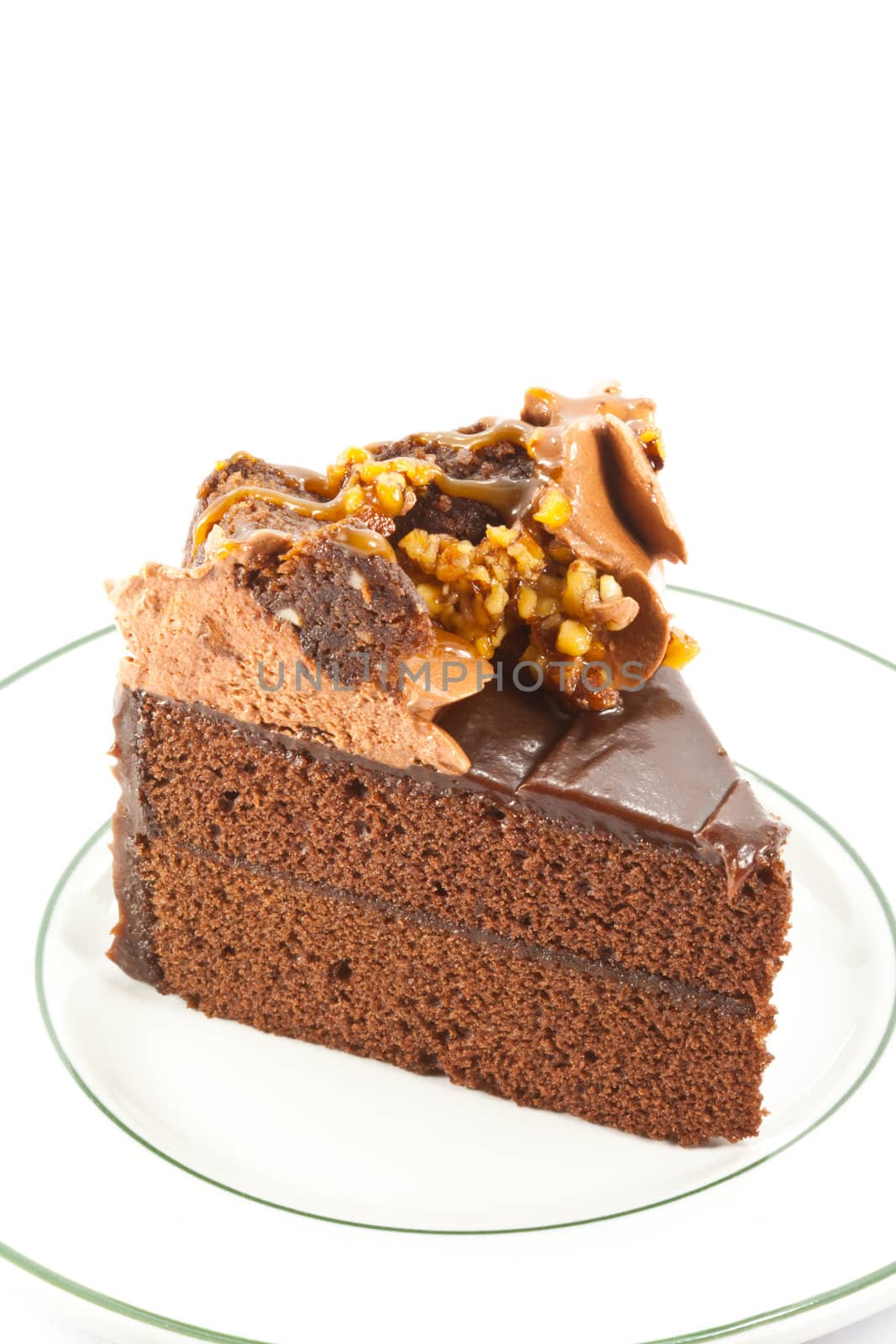 piece of chocolate cake on the white plate