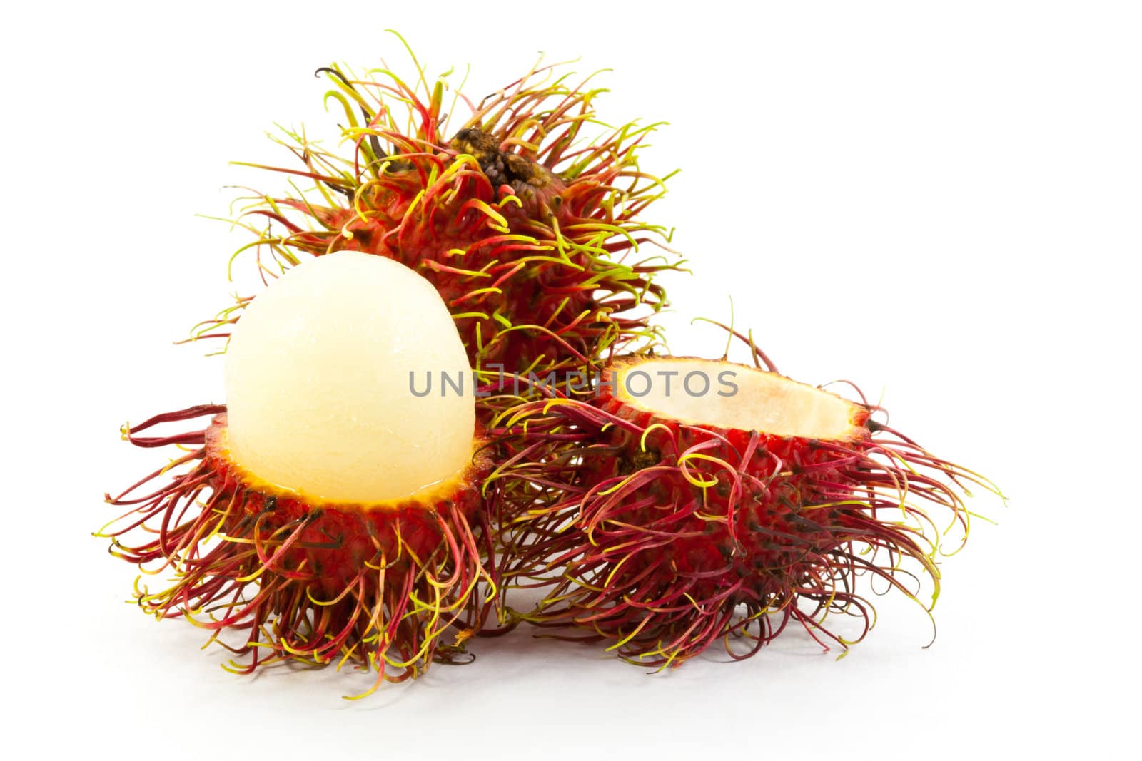 peeled rambutan on white background