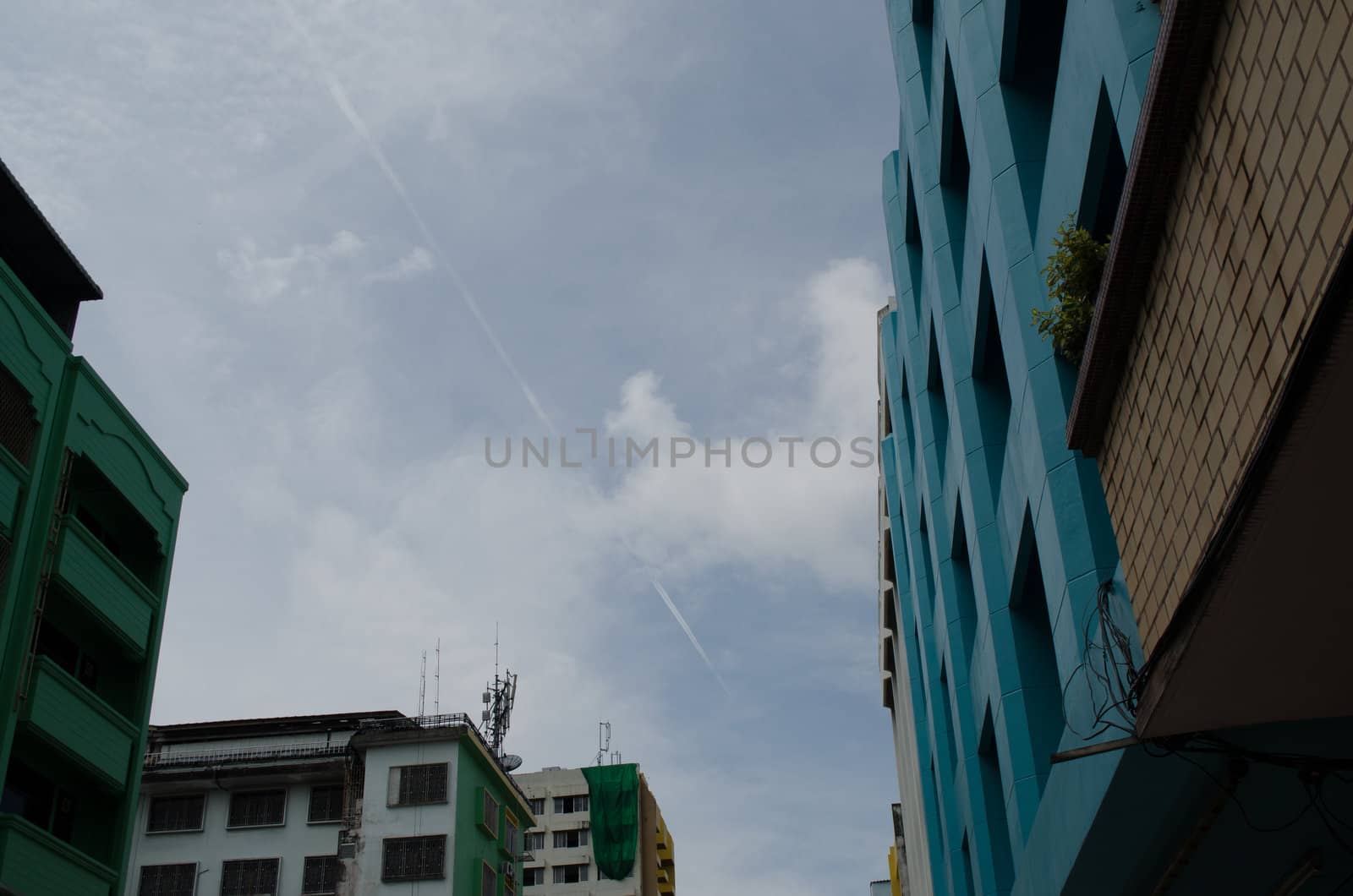 cloud line made from airplane on sky in the city