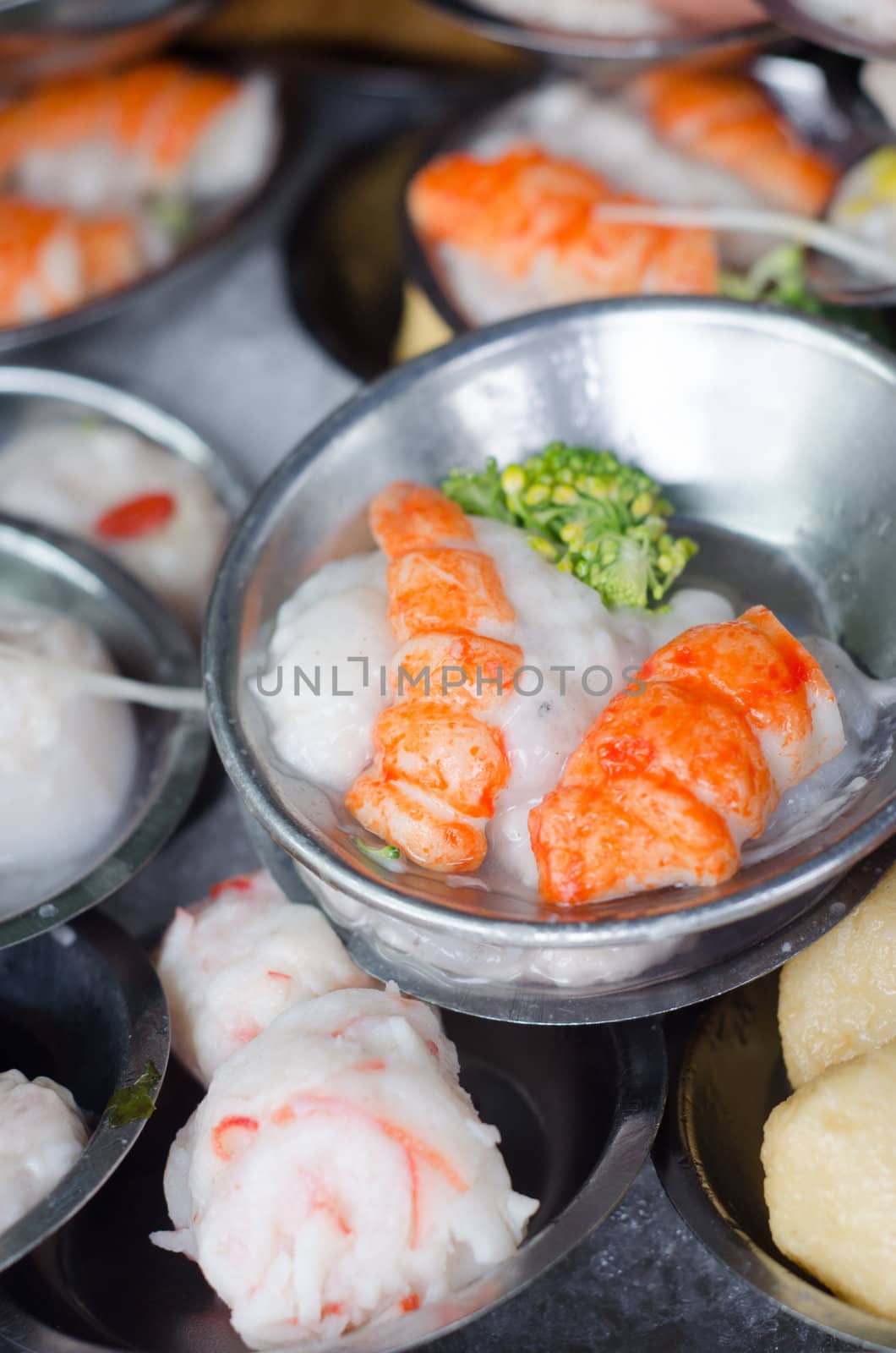 Dimsum chinese food on restaurant served in small metal place by ngarare