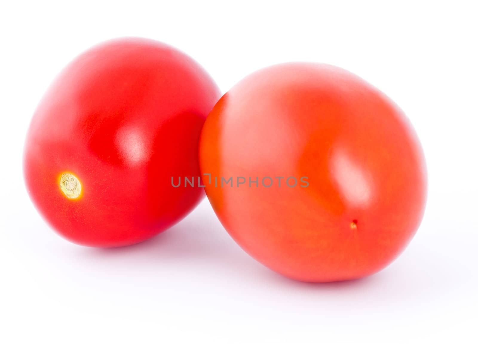 Fresh tomatoes isolated on white background