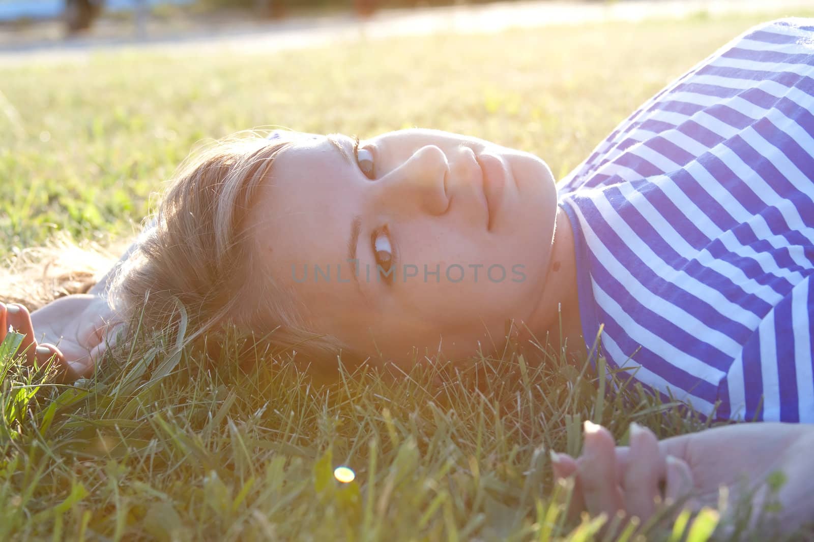 beautiful girl in the shirt on the grass  by victosha