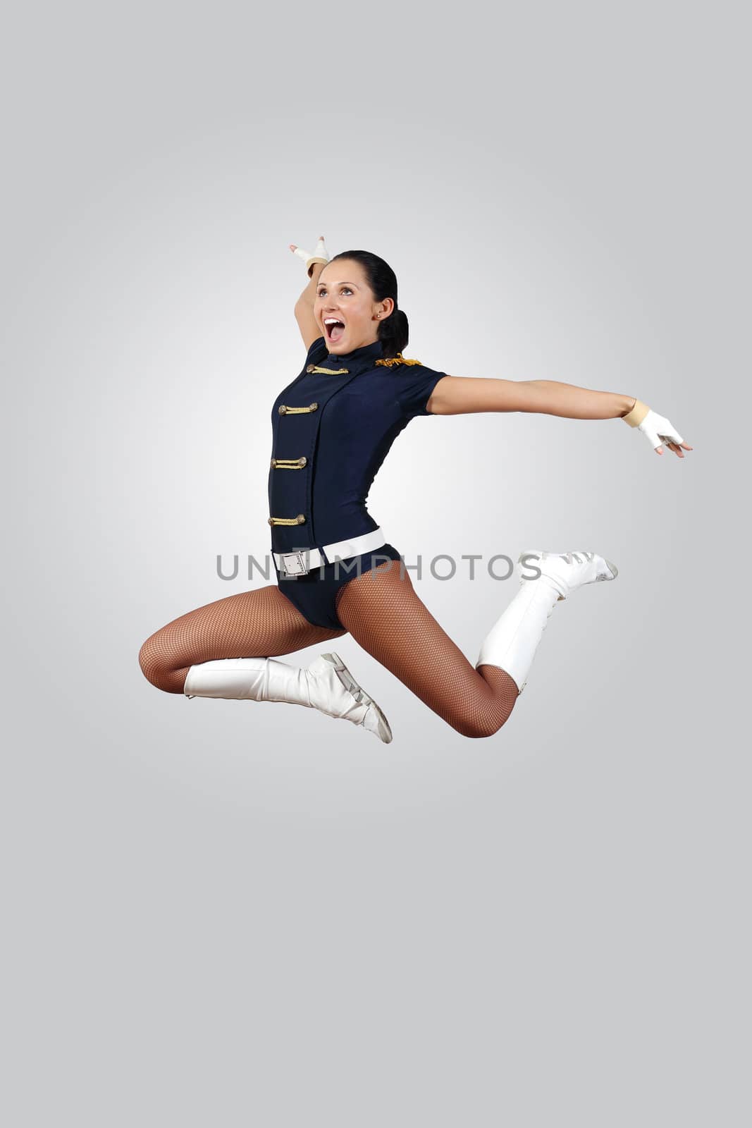 Young female dancer against white background by sergey_nivens