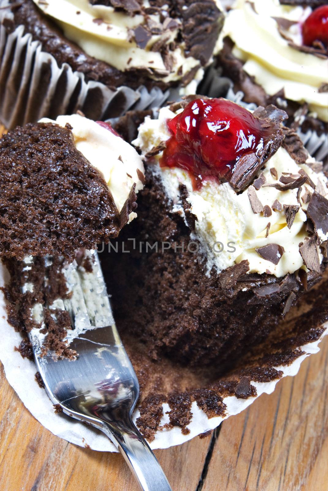 Lovely fresh chocolate cupcakes - very shallow depth of field