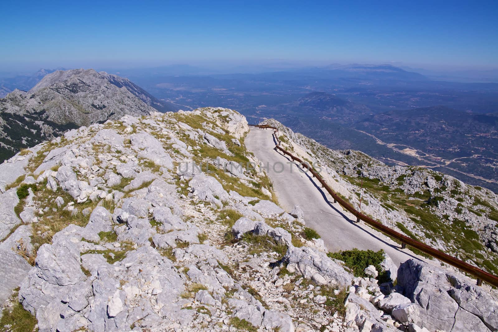 Narrow road across picturesque nature park Biokovo on Dalmatian coast near Makarska Riviera in Croatia