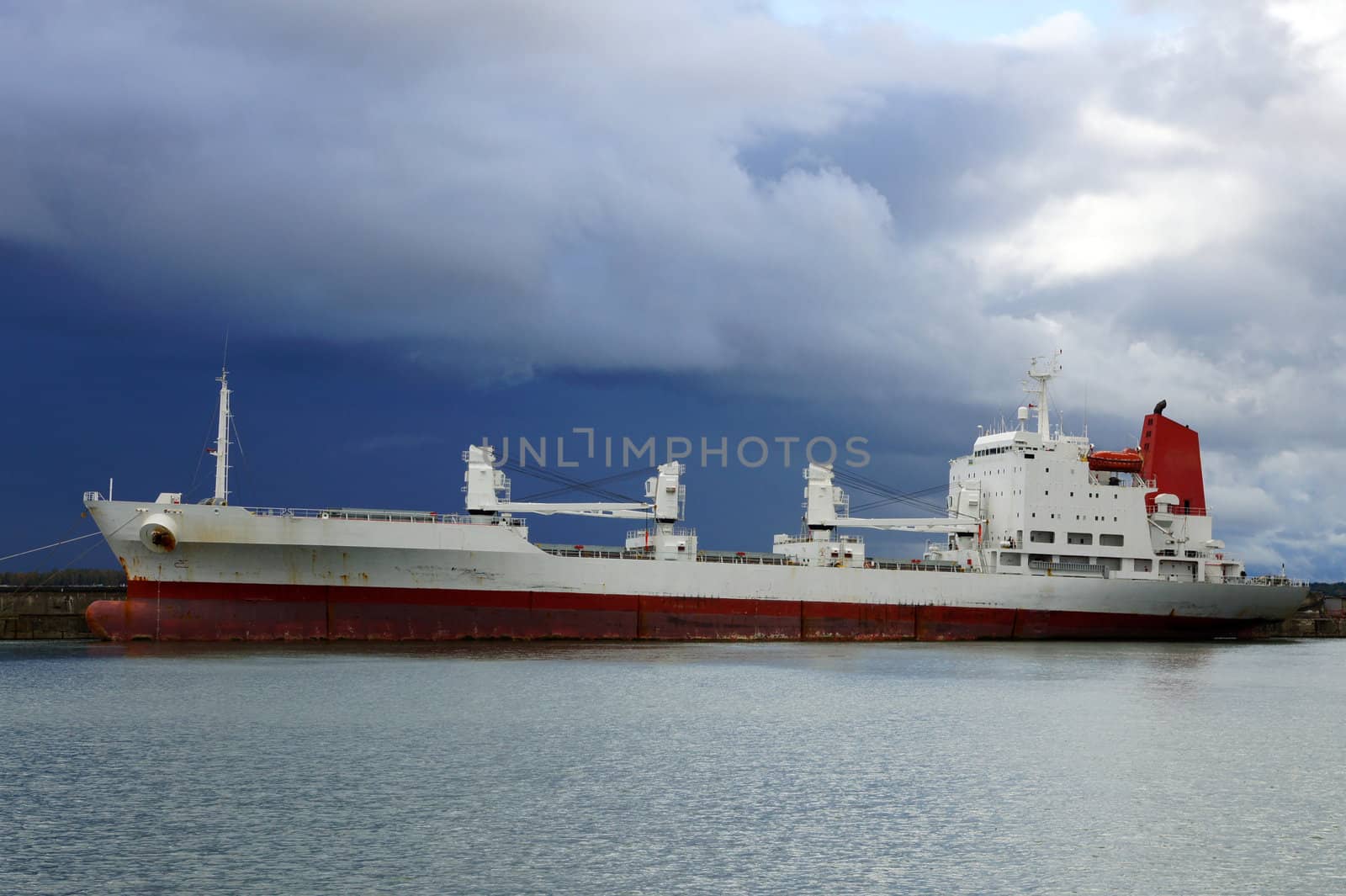 The cargo ship costs at a mooring