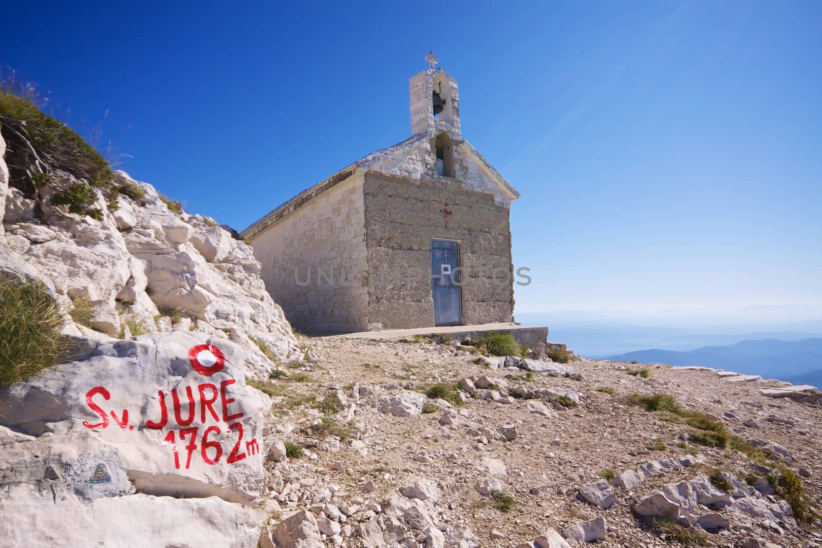 Christian chapel on Sveti Jure, highest mountain of Biokovo nature park on Makarska Riviera in Croatia