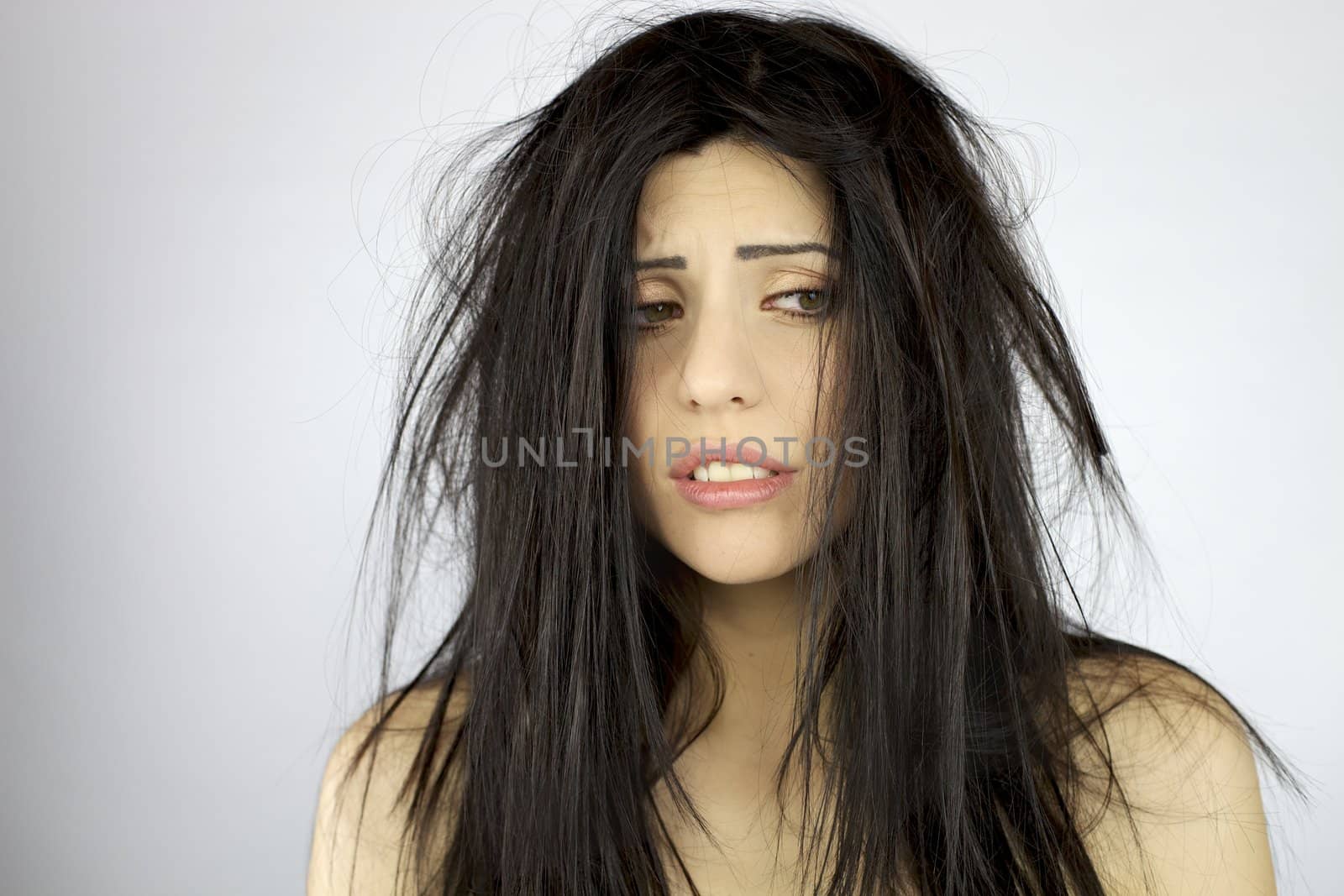 Woman desperate about very bad hair day by fmarsicano