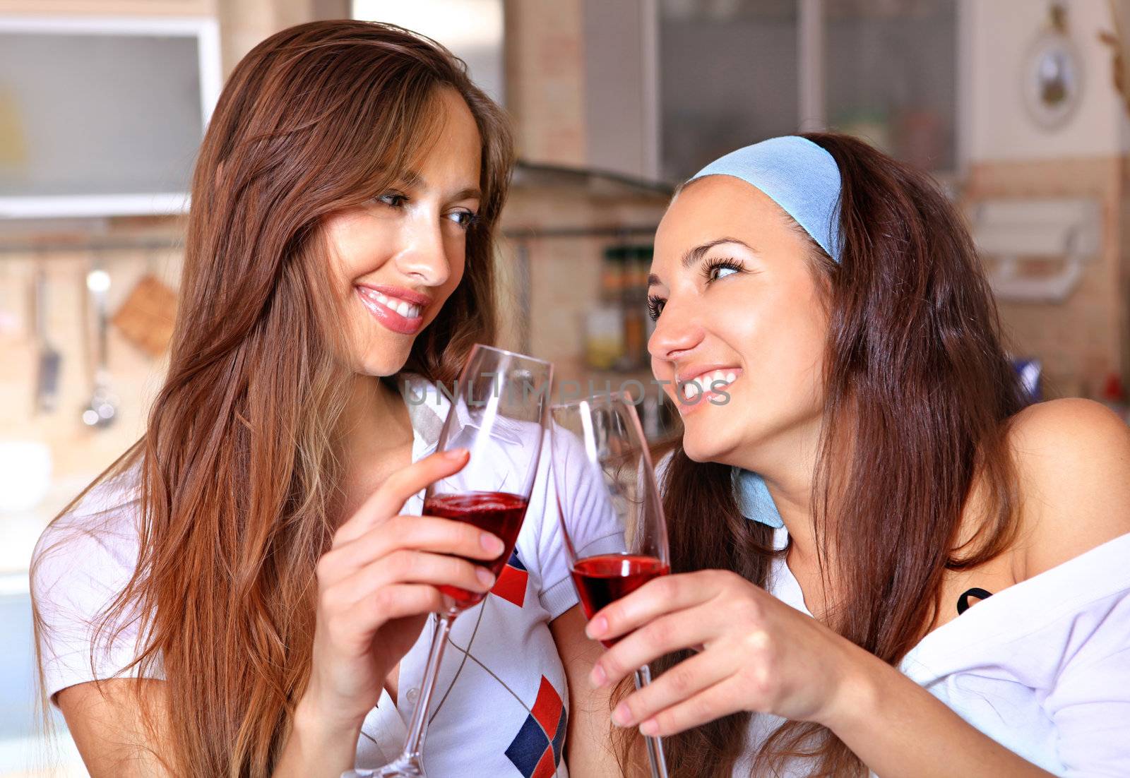 Happy women drinks wine by ssuaphoto