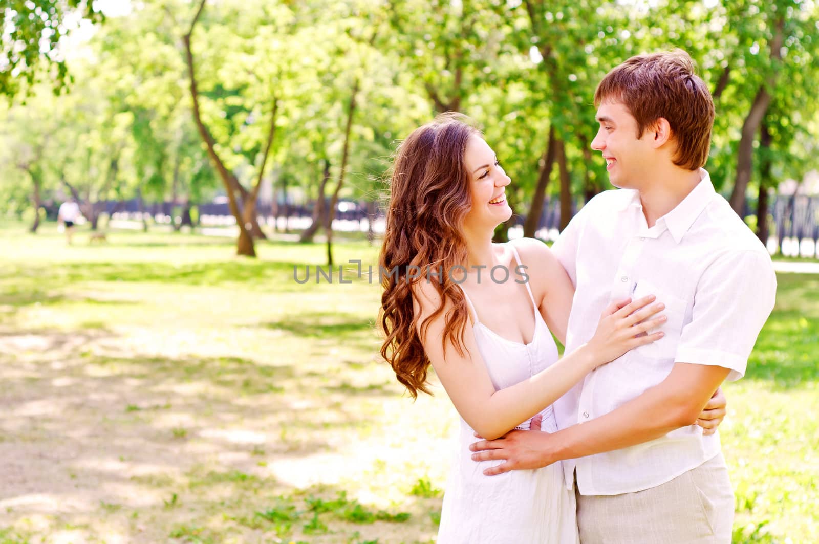 couple hugging in the park, have a good time together