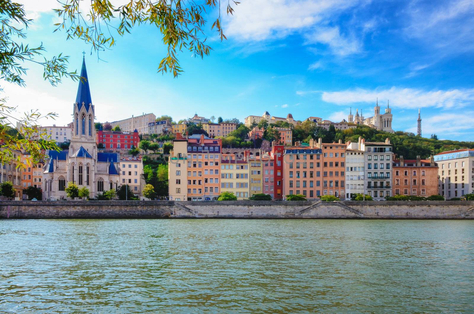 Lyon cityscape from Saone river with colorful houses and river by martinm303