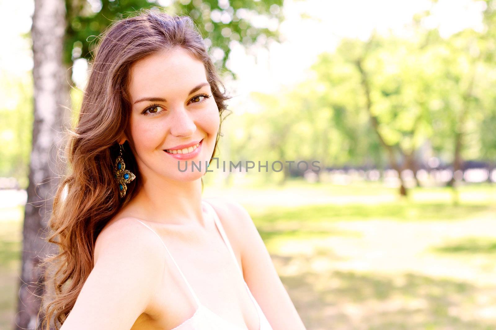 Portrait of an attractive woman in the park