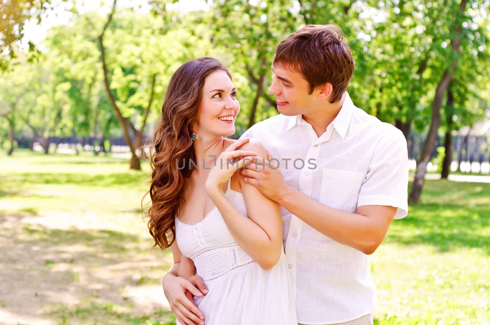 couple hugging in the park, have a good time together