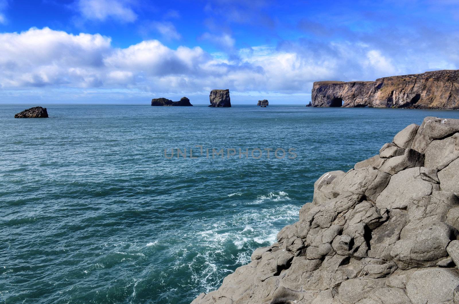 Dyrholeay cliffs and rocks ocean view, Iceland by martinm303