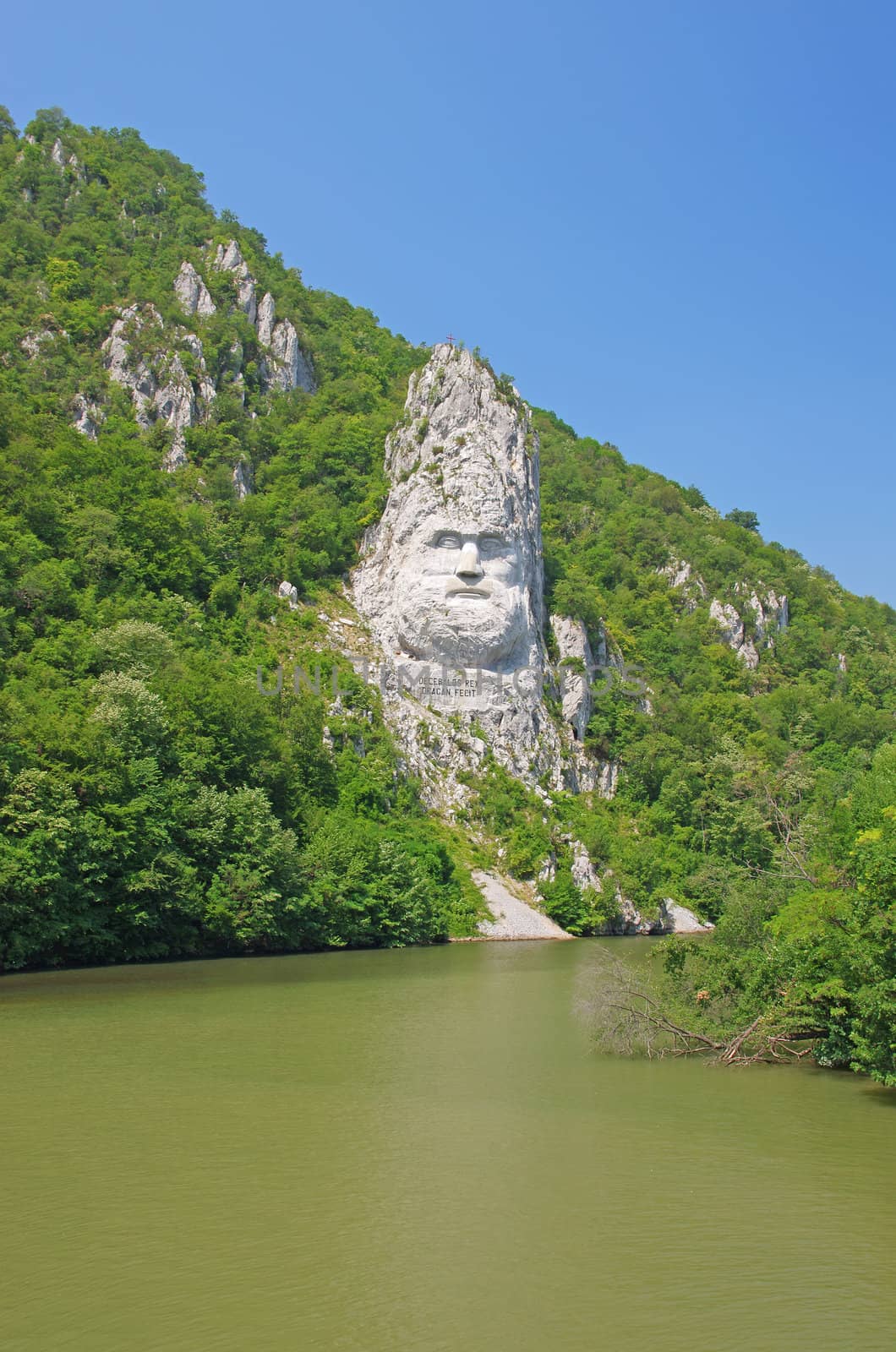 Rock sculpture of Dacian king Decebal on Danube river