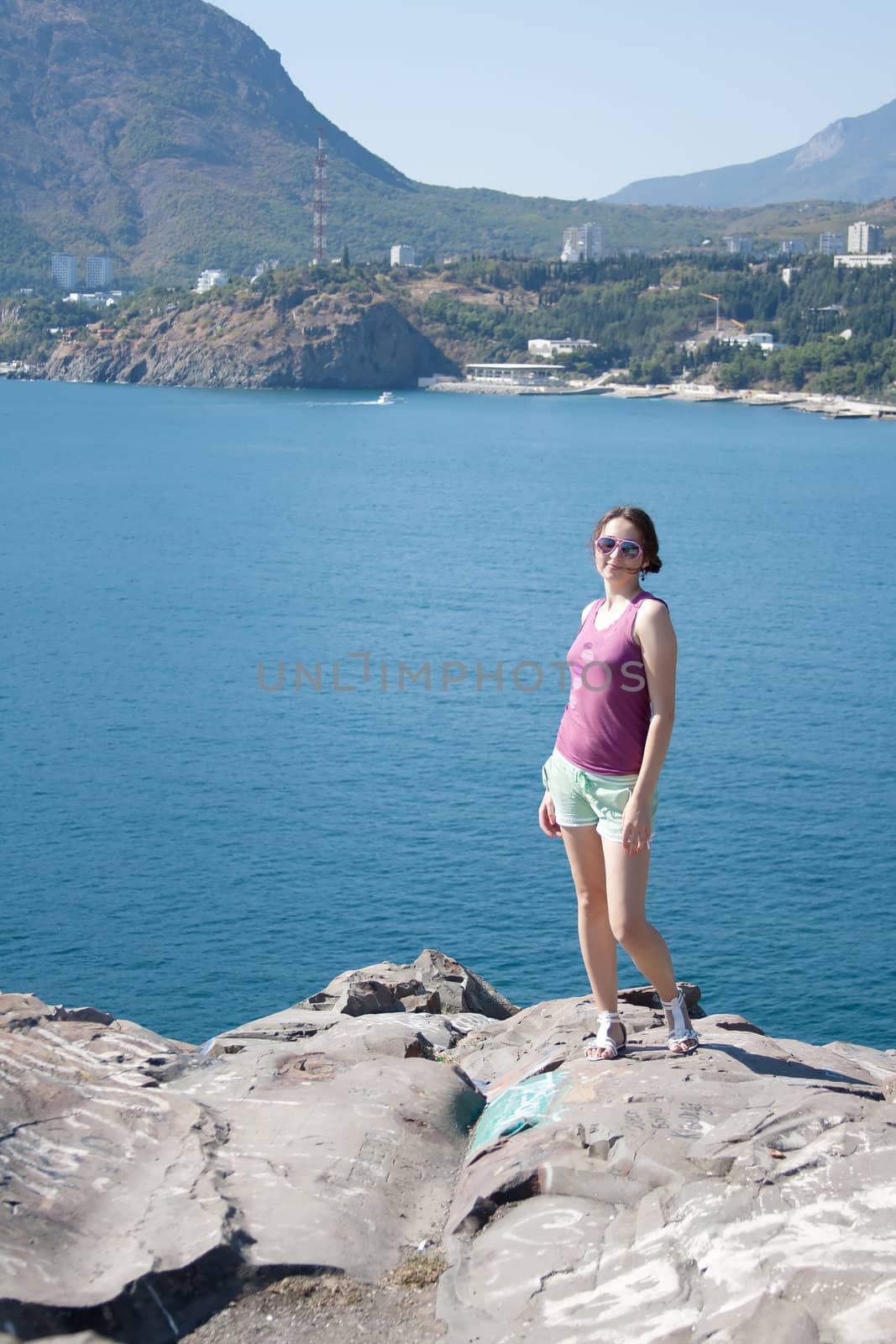girl on sea background shooting outdoors