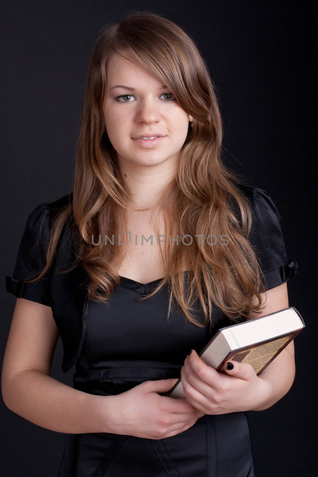 A girl holding a book by victosha