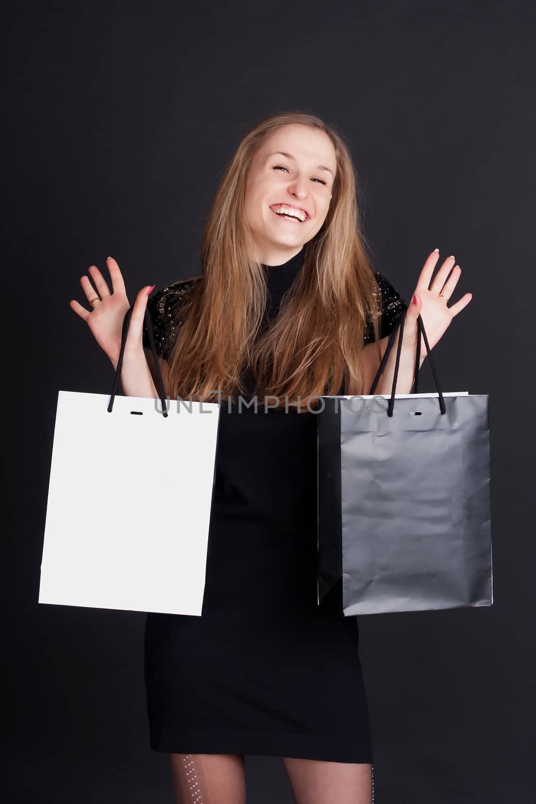 Happy girl with shopping by victosha