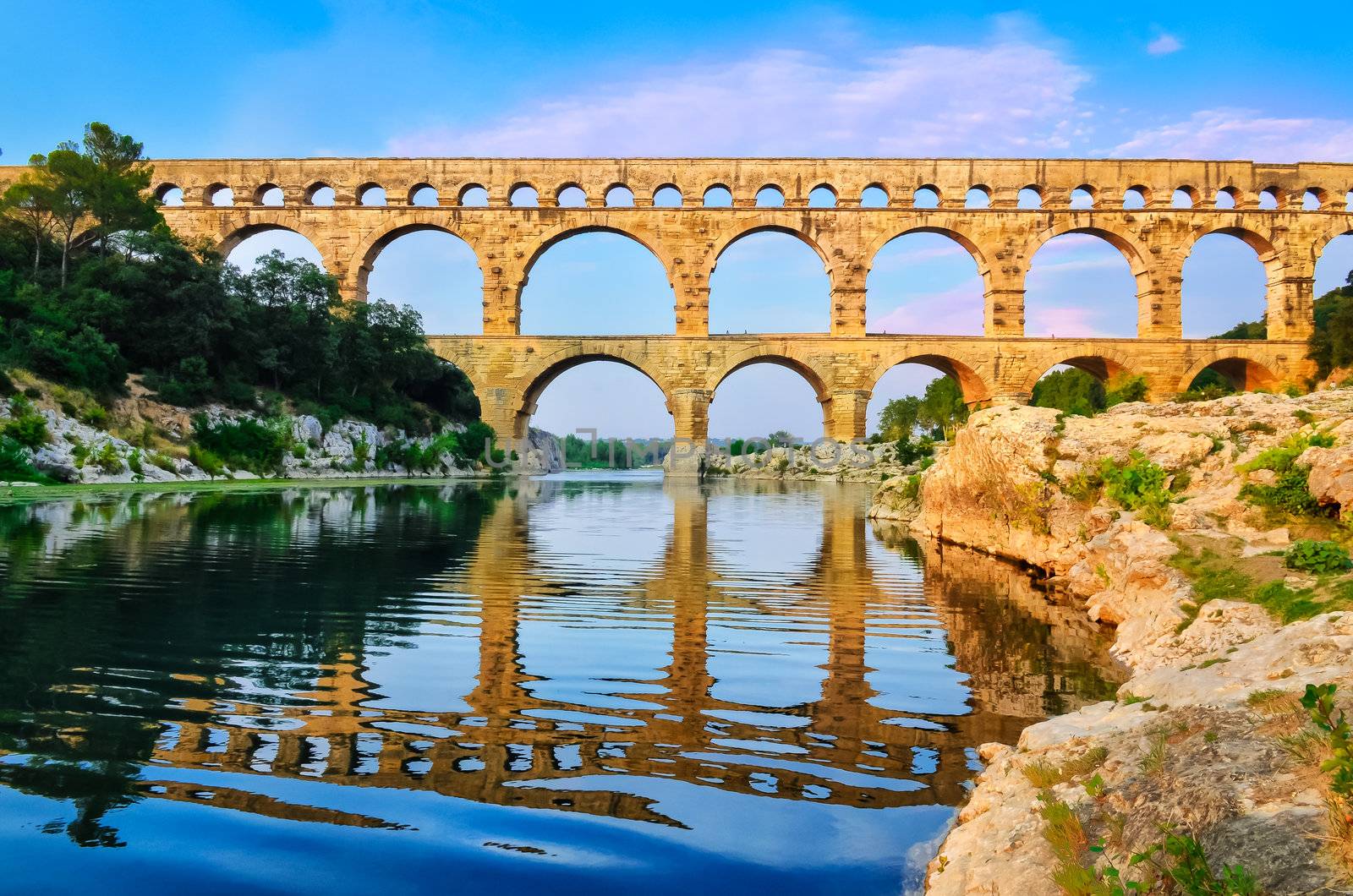 Arc du Triomphe view with reflection in the river, France