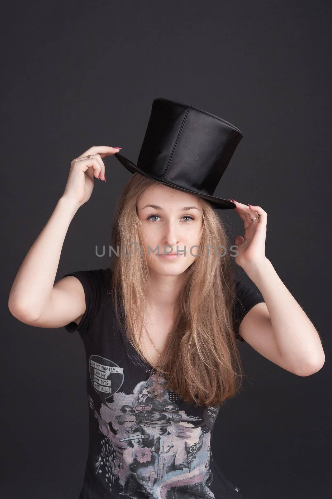 girl with long hair in a hat-cylinder