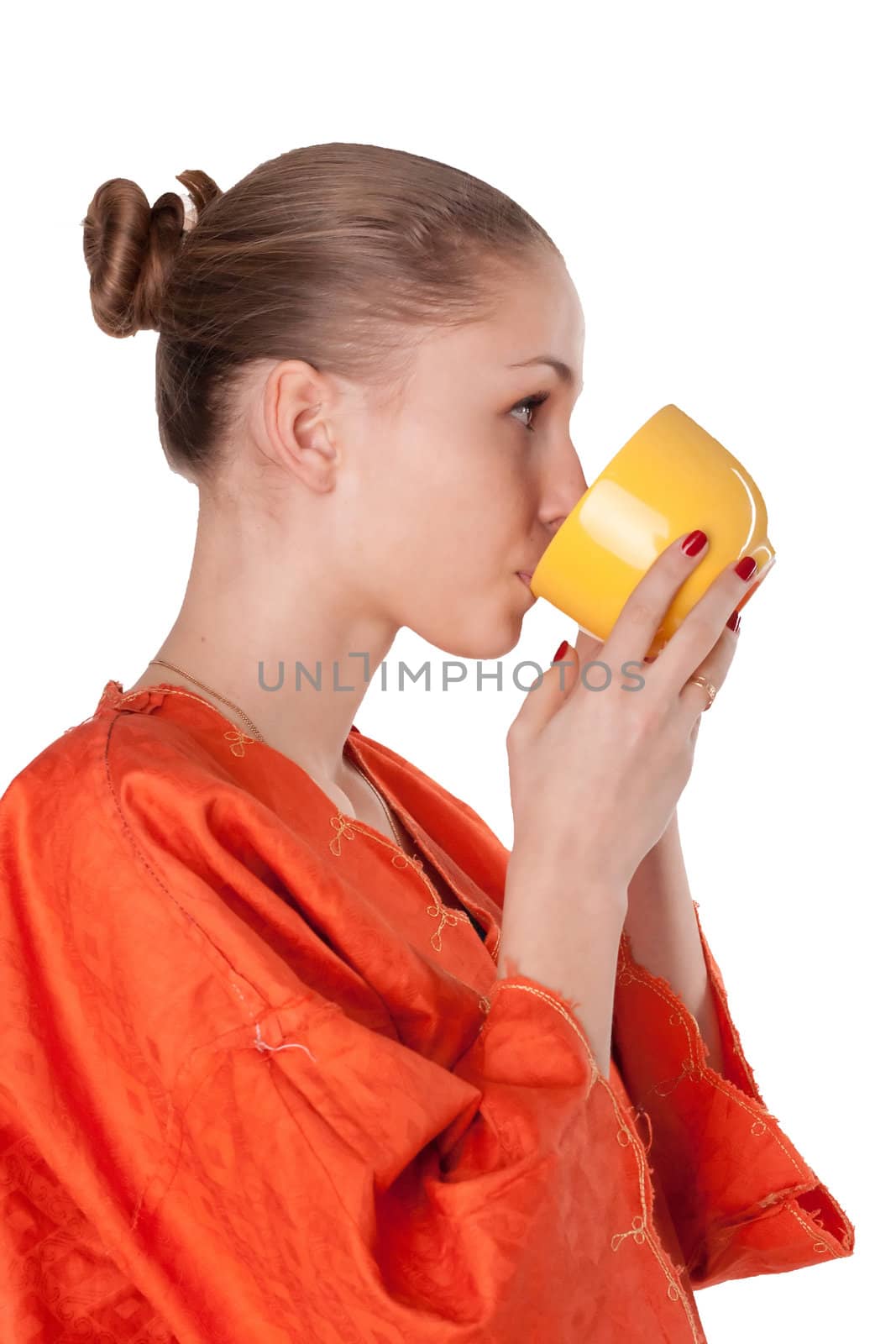 The girl in the orange robe drinking tea studio photography