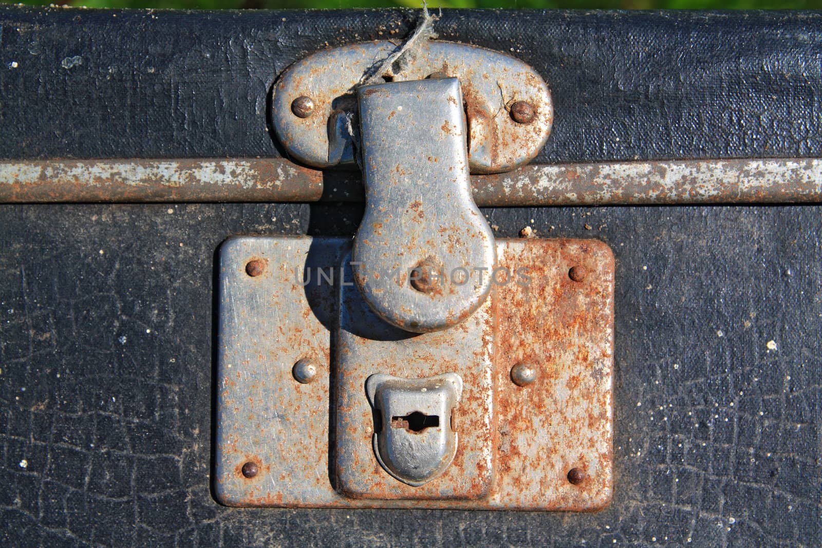 rusty lock on old valise