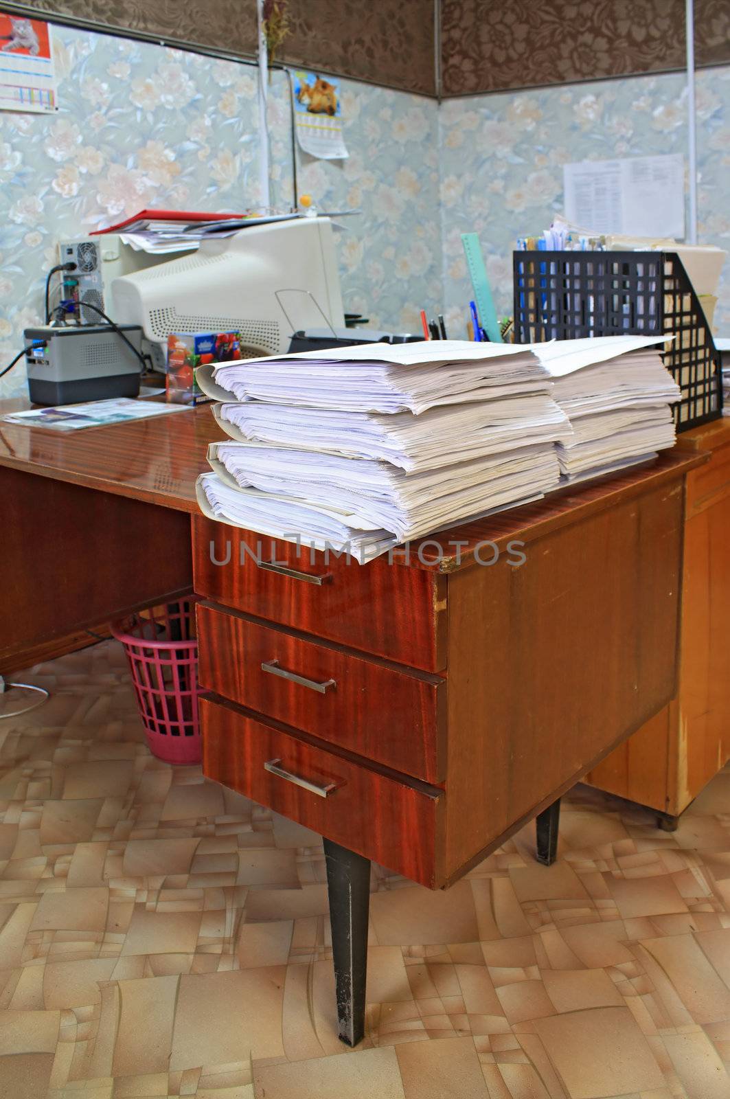 heap of the papers on table in office