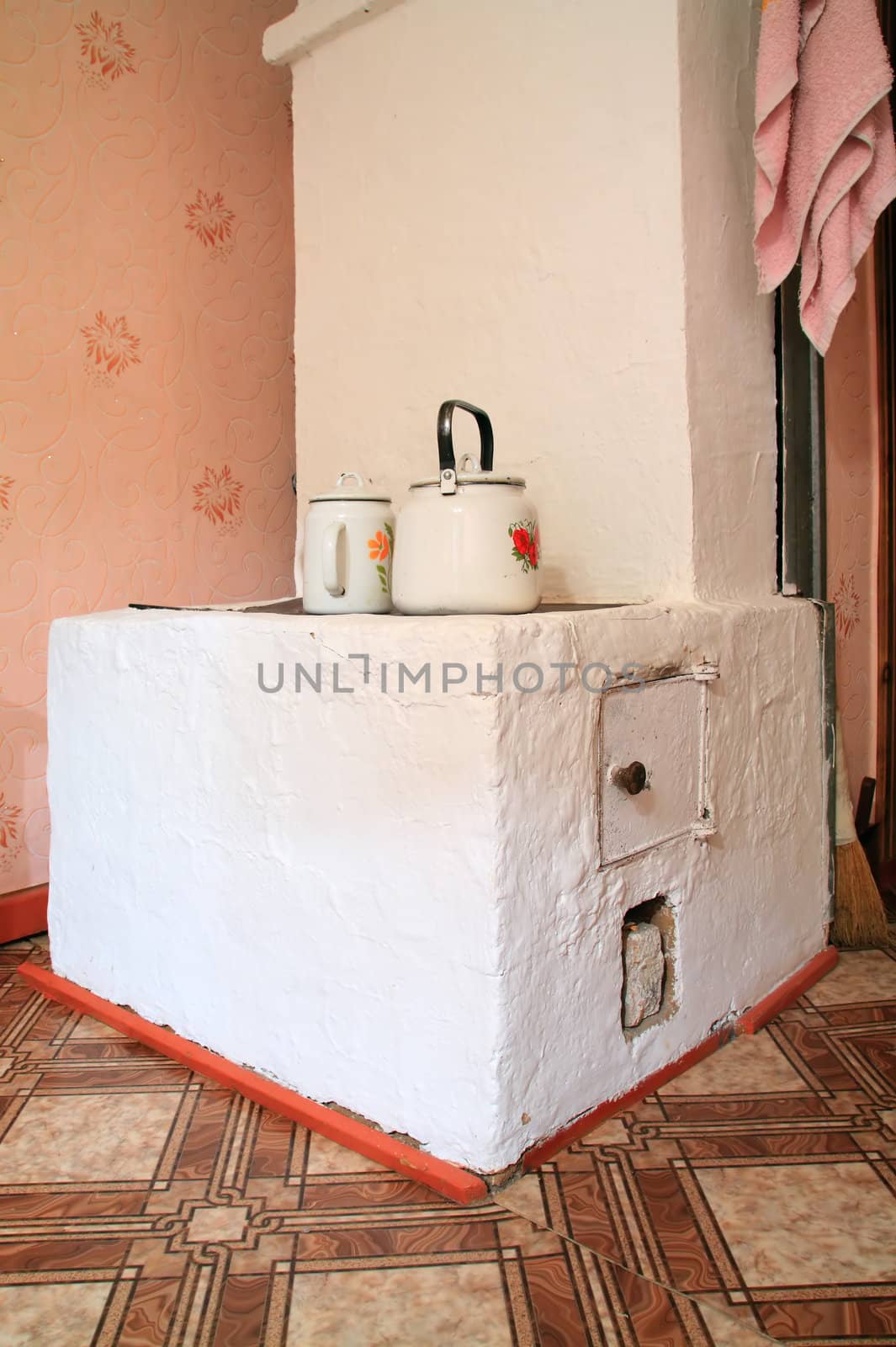 brick stove in rural wooden house by basel101658