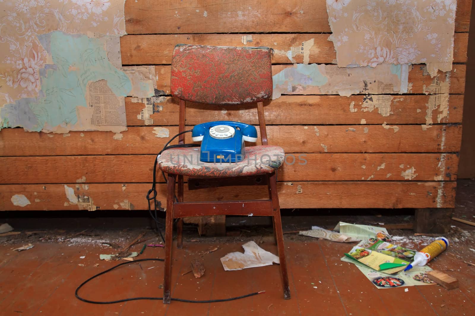 old blue telephone in grunge interior