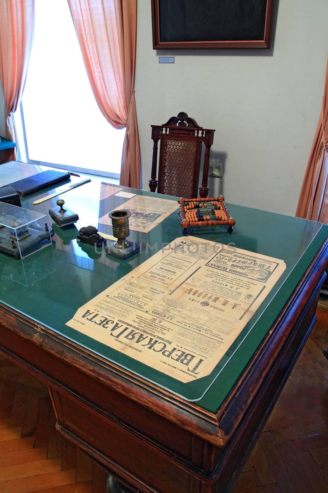 wooden abacus on green table