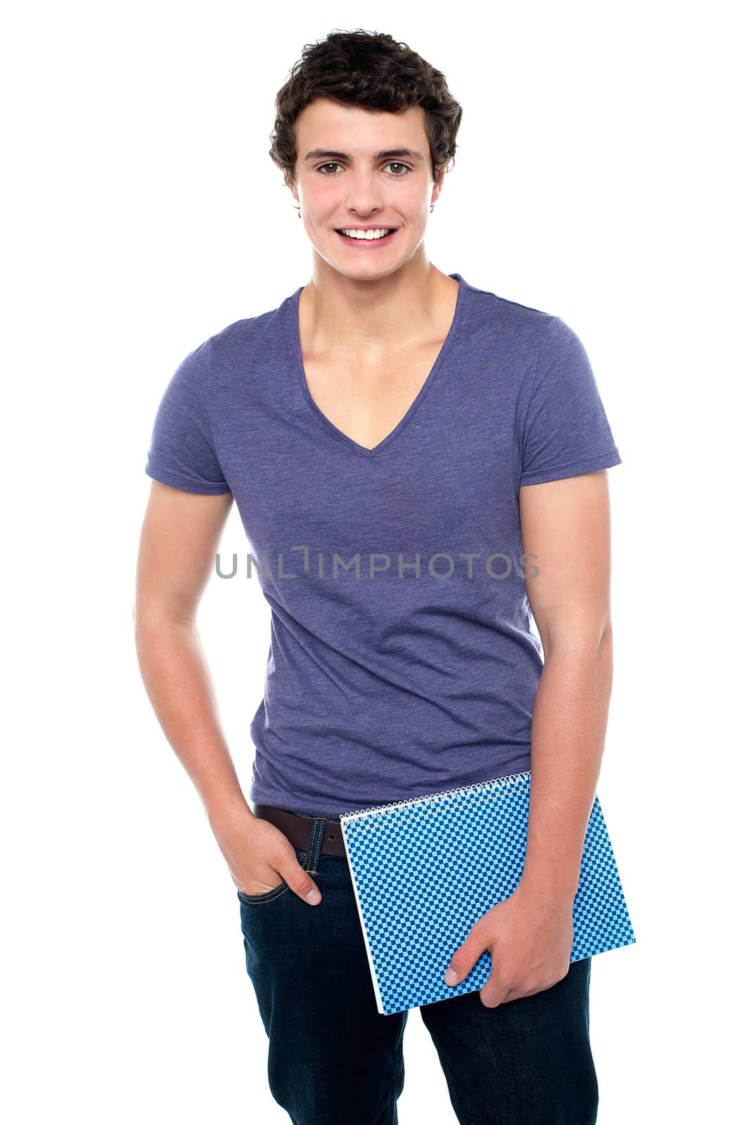 Stylish teenager posing casually in denims isolated against white background