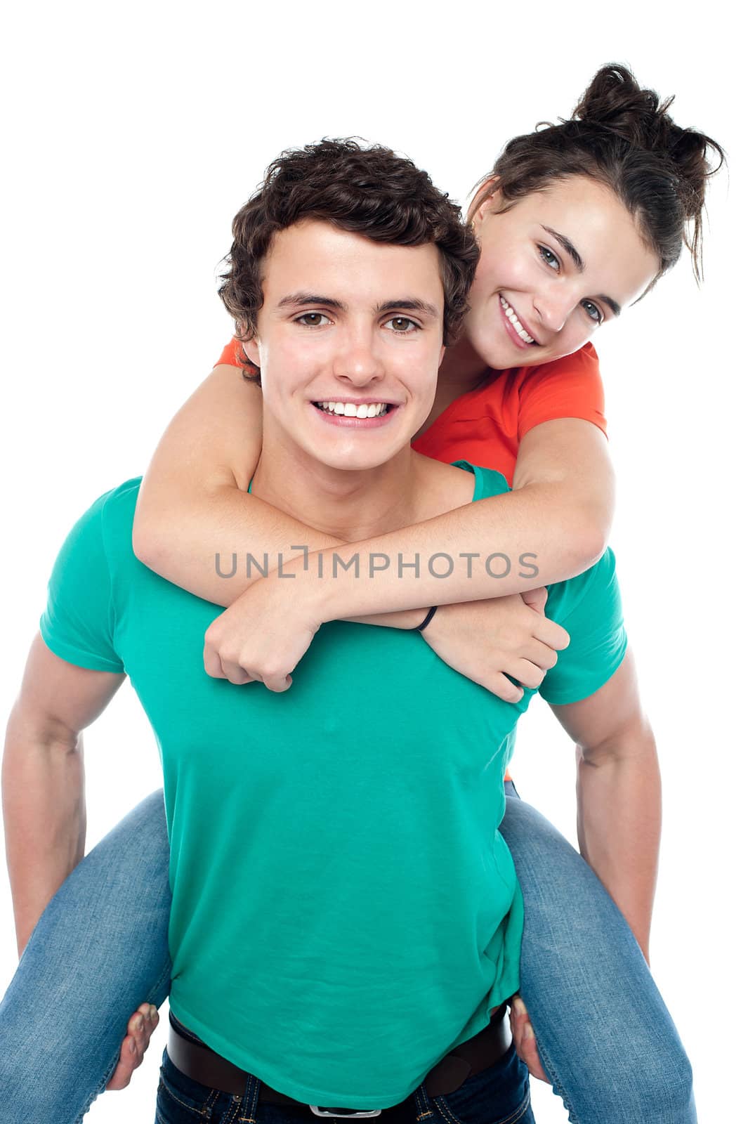 Casual shot of young guy giving piggy ride to his partner. Isolated on white