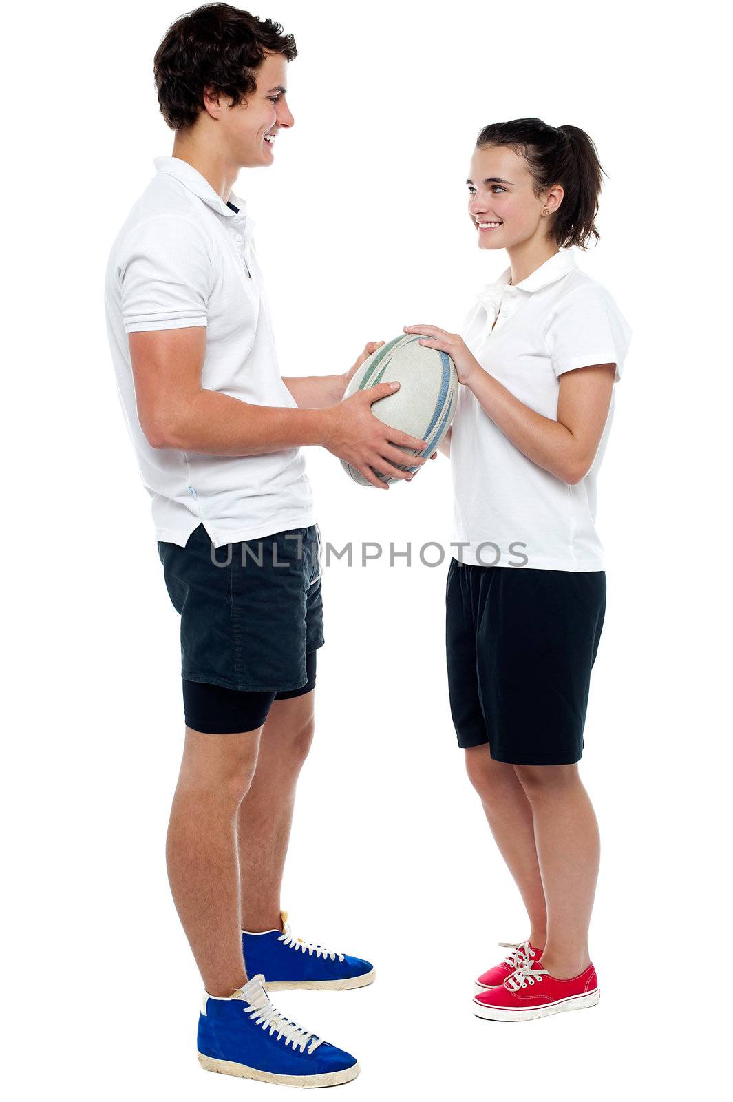 Full length portrait of sporty guy and girl by stockyimages