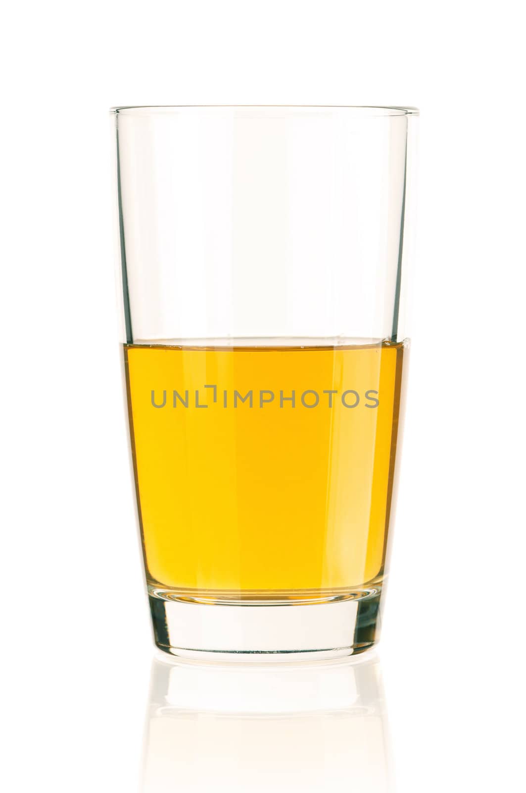 Apple juice in glass isolated on white background