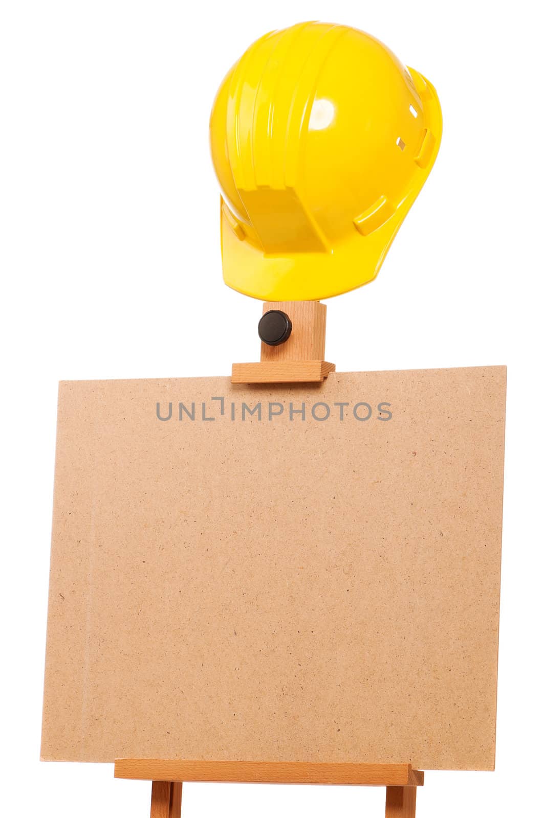 Wooden easel with hard hat isolated on white background