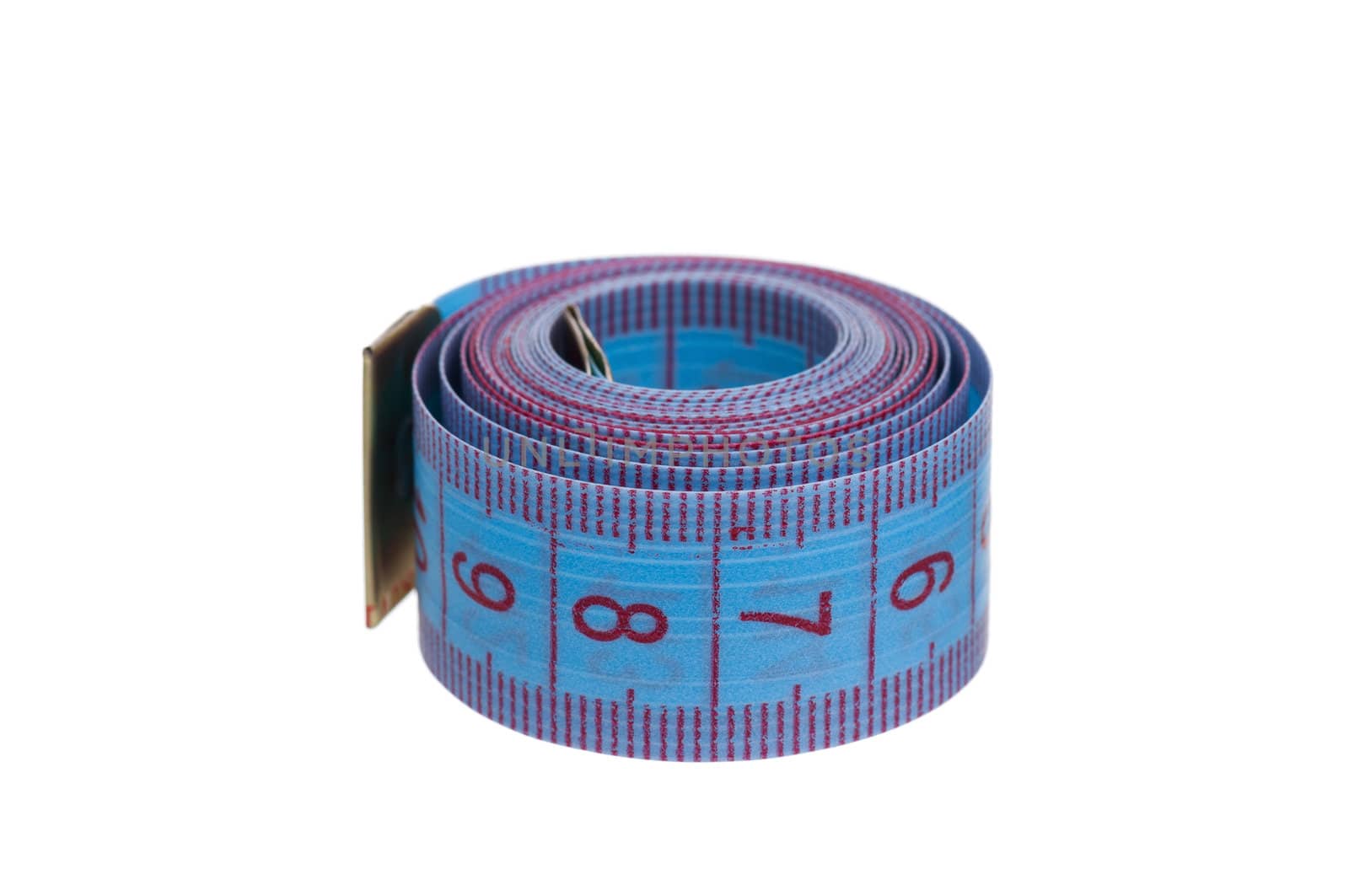 Measuring tape of the tailor over white background