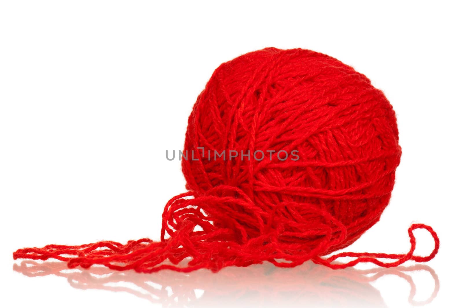 Red ball of yarn for knitting isolated on white background