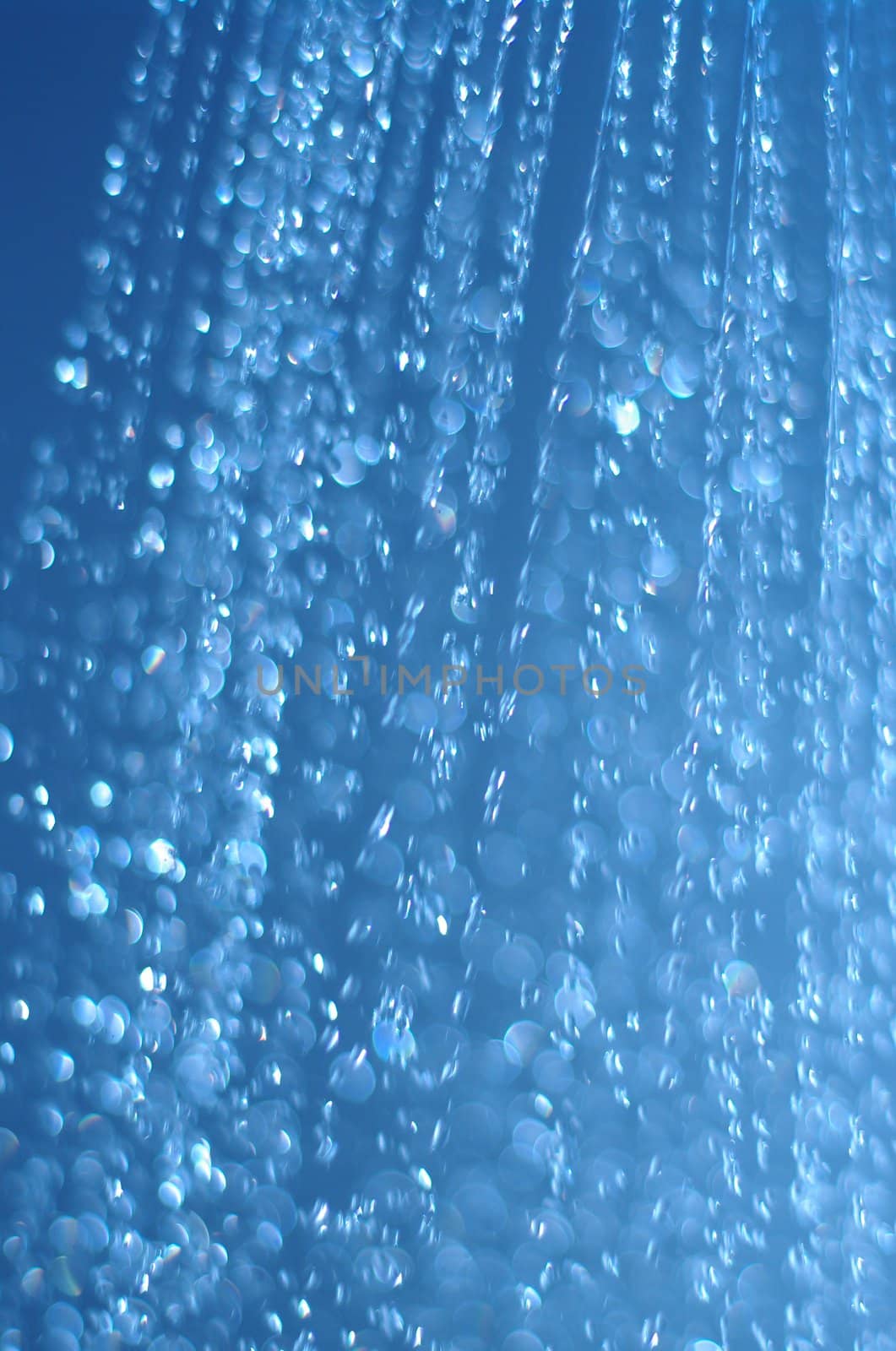 water drops falling from a shower indoors