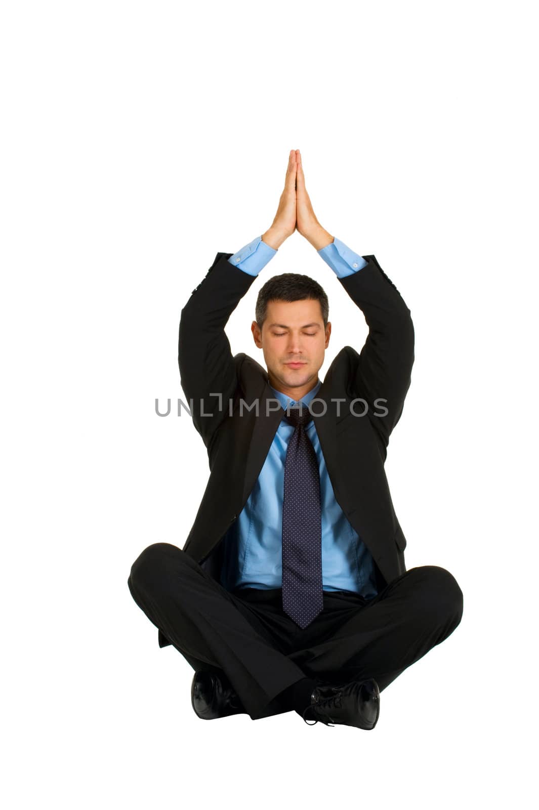 businessman practice yoga by ambro