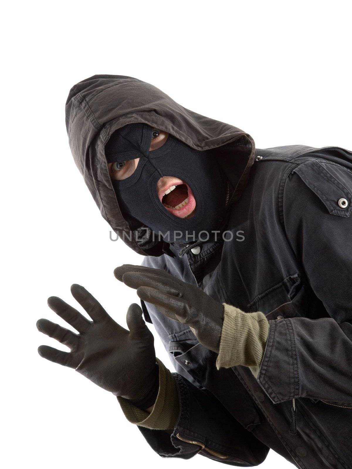 Surprised robber in a black mask